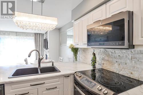 35 - 21 Laguna Parkway, Ramara (Brechin), ON - Indoor Photo Showing Kitchen With Double Sink