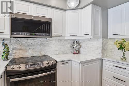 35 - 21 Laguna Parkway, Ramara (Brechin), ON - Indoor Photo Showing Kitchen With Upgraded Kitchen