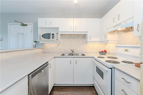 1800 Walkers Line Unit# 310, Burlington, ON - Indoor Photo Showing Kitchen With Double Sink