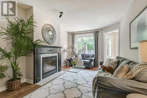 2169 Grand Ravine Drive, Oakville (River Oaks), ON - Indoor Photo Showing Living Room With Fireplace