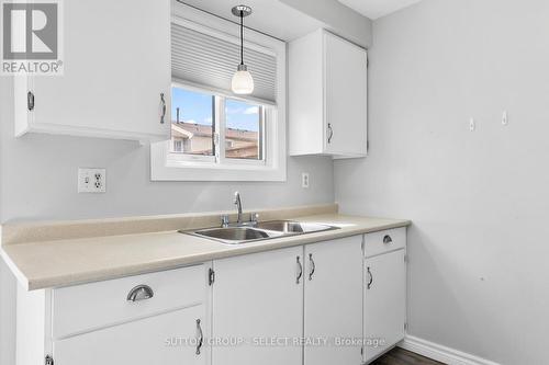 94 - 90 Tiffany Drive, London, ON - Indoor Photo Showing Kitchen With Double Sink