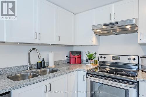 304 - 64 Frederick Drive, Guelph (Guelph South), ON - Indoor Photo Showing Kitchen With Double Sink