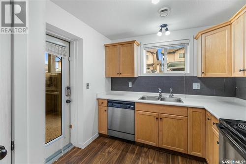 36 4640 Harbour Landing Drive, Regina, SK - Indoor Photo Showing Kitchen With Double Sink