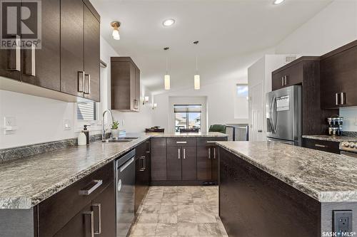 1246 Hargreaves Way, Saskatoon, SK - Indoor Photo Showing Kitchen With Double Sink With Upgraded Kitchen