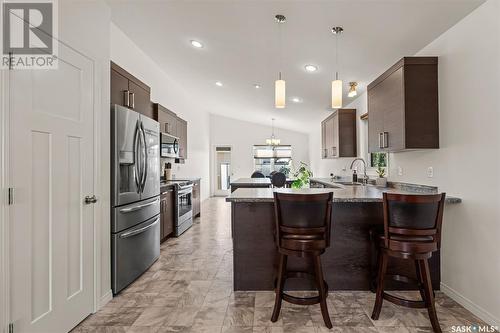 1246 Hargreaves Way, Saskatoon, SK - Indoor Photo Showing Kitchen With Upgraded Kitchen