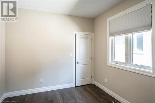 Bedroom 2 of 3 on the Main Floor with Laundry Closet - 403 Normanton Street, Port Elgin, ON - Indoor Photo Showing Other Room