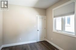 Bedroom 2 of 3 on the Main Floor with Laundry Closet - 