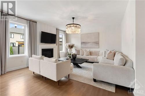 31 Conch Way, Manotick, ON - Indoor Photo Showing Living Room With Fireplace