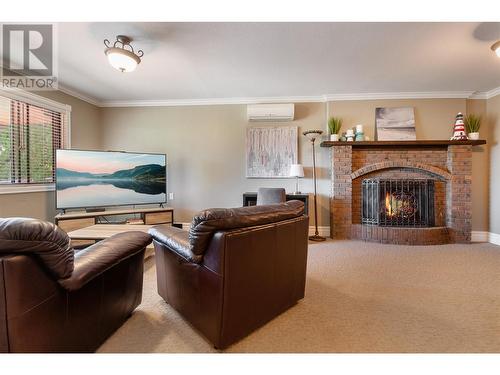 824 Ricker Road, Cawston, BC - Indoor Photo Showing Living Room With Fireplace