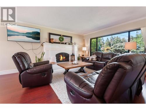 824 Ricker Road, Cawston, BC - Indoor Photo Showing Living Room With Fireplace