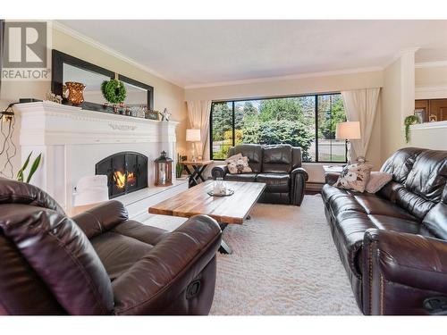 824 Ricker Road, Cawston, BC - Indoor Photo Showing Living Room With Fireplace