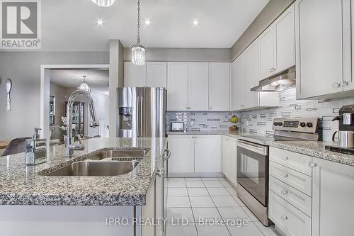 79 Willoughby Way, New Tecumseth, ON - Indoor Photo Showing Kitchen With Stainless Steel Kitchen With Double Sink With Upgraded Kitchen