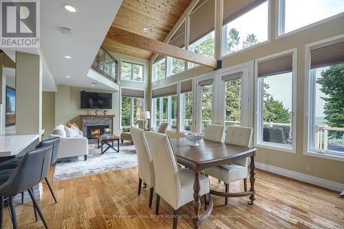 4 - 75 Maple Avenue S, Mississauga (Port Credit), ON - Indoor Photo Showing Dining Room With Fireplace