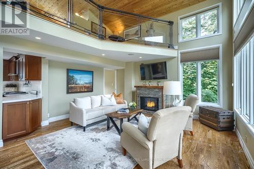 4 - 75 Maple Avenue S, Mississauga (Port Credit), ON - Indoor Photo Showing Living Room With Fireplace