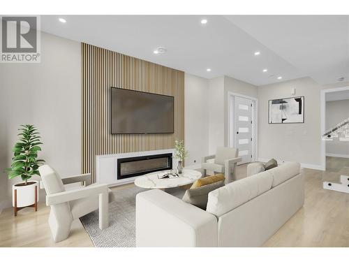 705 Raymer Road, Kelowna, BC - Indoor Photo Showing Living Room With Fireplace