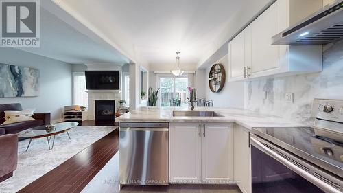 6 Sunridge Street, Richmond Hill (Oak Ridges), ON - Indoor Photo Showing Kitchen With Fireplace