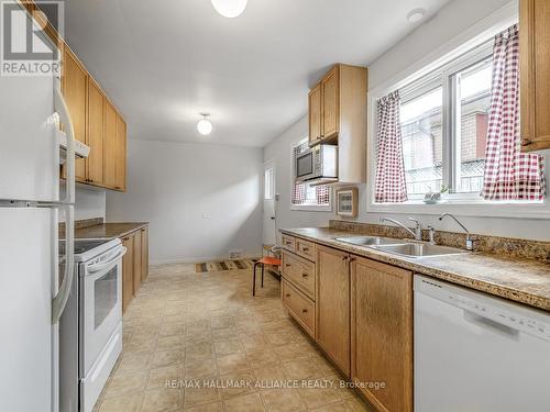 71 Wheatsheaf Crescent, Toronto (Black Creek), ON - Indoor Photo Showing Kitchen With Double Sink