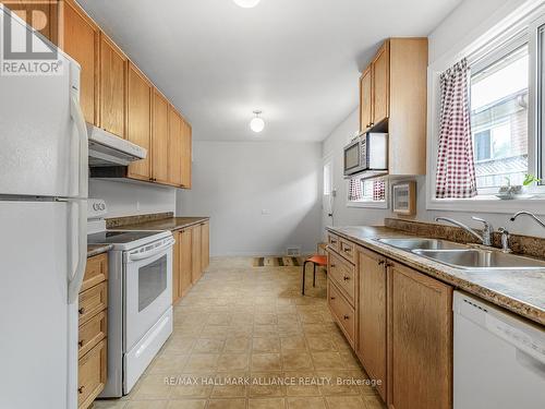 71 Wheatsheaf Crescent, Toronto (Black Creek), ON - Indoor Photo Showing Kitchen With Double Sink