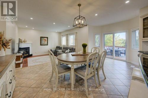 58 West Acres Crescent, Kitchener, ON - Indoor Photo Showing Dining Room With Fireplace