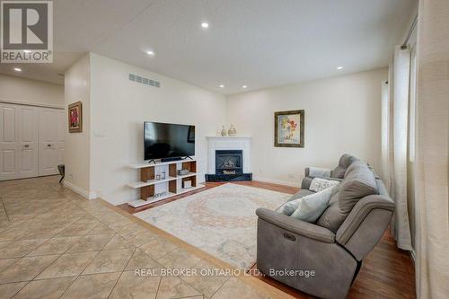 58 West Acres Crescent, Kitchener, ON - Indoor Photo Showing Living Room With Fireplace