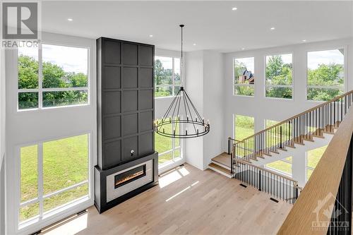 705 Mcmanus Avenue, Manotick, ON - Indoor With Fireplace