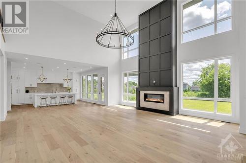 705 Mcmanus Avenue, Manotick, ON - Indoor Photo Showing Living Room With Fireplace