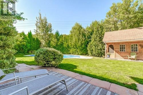 2489 Yarmouth Crescent, Oakville, ON - Outdoor With In Ground Pool With Deck Patio Veranda