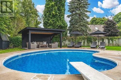 66 Willow Landing Road, Springwater (Midhurst), ON - Outdoor With In Ground Pool With Backyard