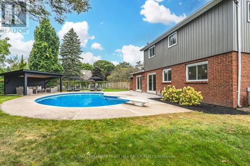 66 Willow Landing Road, Springwater (Midhurst), ON - Outdoor With In Ground Pool