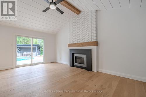 66 Willow Landing Road, Springwater (Midhurst), ON - Indoor Photo Showing Living Room With Fireplace