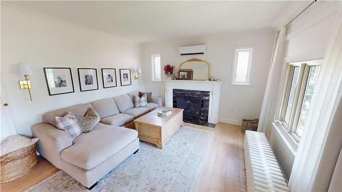 Living Room - 5953 Carlton Avenue, Niagara Falls, ON - Indoor Photo Showing Living Room With Fireplace