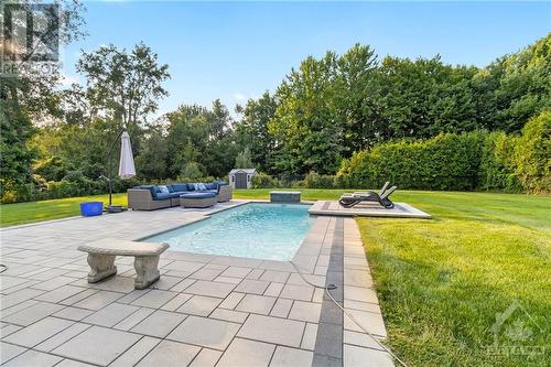 6131 Pebblewoods Drive, Greely, ON - Outdoor With In Ground Pool With Backyard