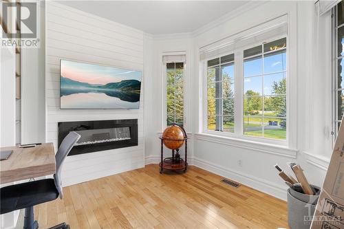 6131 Pebblewoods Drive, Greely, ON - Indoor With Fireplace