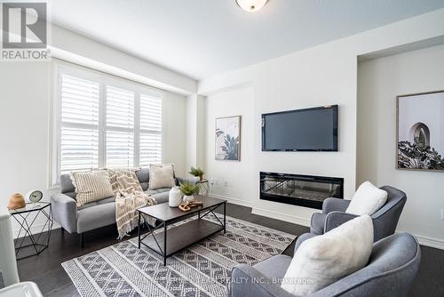 51 Conarty Crescent, Whitby, ON - Indoor Photo Showing Living Room With Fireplace