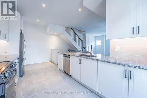 52 - 30 Lunar Crescent, Mississauga, ON - Indoor Photo Showing Kitchen With Double Sink With Upgraded Kitchen