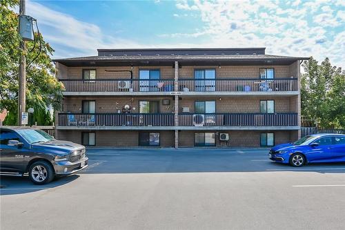 Low rise building. - 482 James Street N Unit# 203, Hamilton, ON - Outdoor With Balcony With Facade