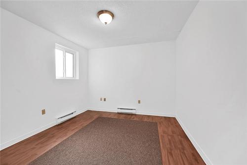 Second bedroom with window for natural light - 482 James Street N Unit# 203, Hamilton, ON - Indoor Photo Showing Other Room