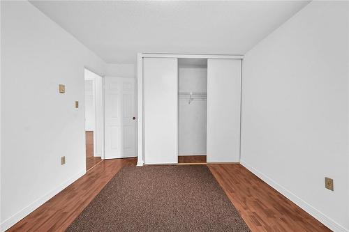 Second bedroom with closet space too - 482 James Street N Unit# 203, Hamilton, ON - Indoor Photo Showing Other Room