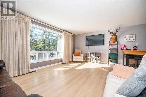 872 Archibald Street, Braeside, ON - Indoor Photo Showing Living Room With Fireplace