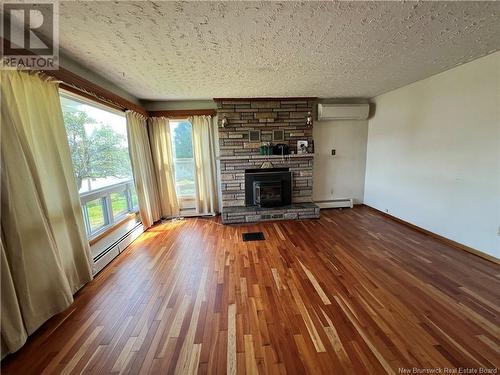 220 Milford Road, Saint John, NB - Indoor Photo Showing Living Room With Fireplace