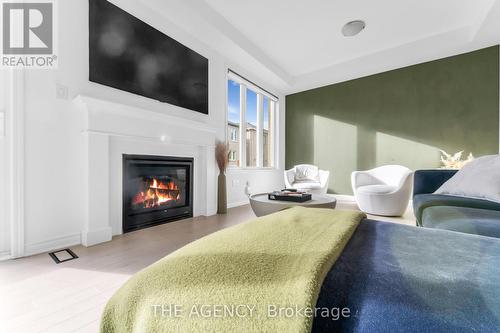 495 Violet Gate, Milton, ON - Indoor Photo Showing Living Room With Fireplace