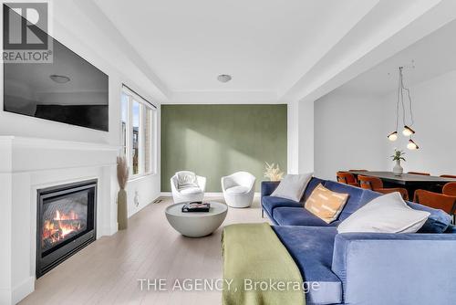 495 Violet Gate, Milton, ON - Indoor Photo Showing Living Room With Fireplace