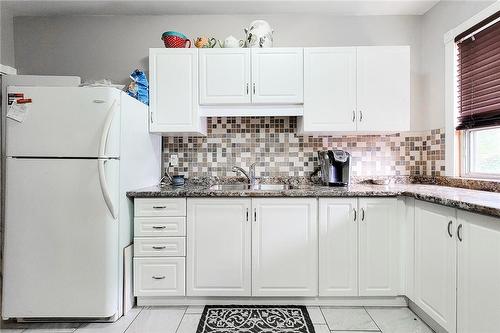 114 Tisdale Street N, Hamilton, ON - Indoor Photo Showing Kitchen With Double Sink