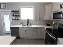 3807 Wirtl Street, Terrace, BC  - Indoor Photo Showing Kitchen With Double Sink 