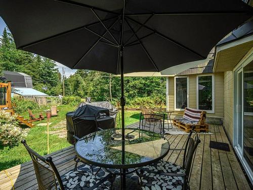 Backyard - 15 Rue Du Domaine-Després, Sainte-Marguerite-Du-Lac-Masson, QC - Outdoor With Deck Patio Veranda With Exterior