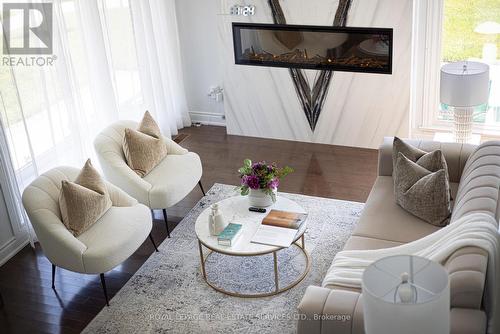 2 Markanna Drive, Toronto (Scarborough Village), ON - Indoor Photo Showing Living Room With Fireplace