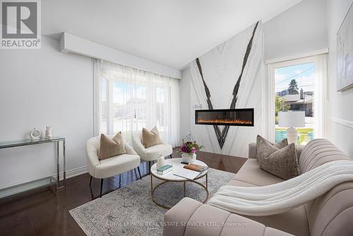 2 Markanna Drive, Toronto (Scarborough Village), ON - Indoor Photo Showing Living Room With Fireplace