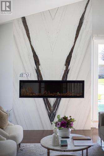 2 Markanna Drive, Toronto (Scarborough Village), ON - Indoor Photo Showing Living Room With Fireplace