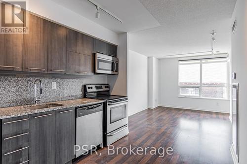 201 - 38 Joe Shuster Way, Toronto (South Parkdale), ON - Indoor Photo Showing Kitchen With Upgraded Kitchen