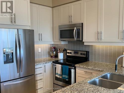 915 - 1185 The Queensway Way, Toronto (Islington-City Centre West), ON - Indoor Photo Showing Kitchen With Double Sink With Upgraded Kitchen